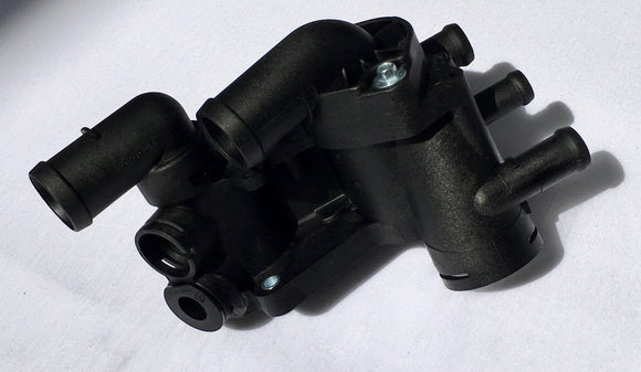 TOMA AGUA VW POLO 2 BULBOS 6 SALIDAS CON PIPA LATERAL (ALEMAN)     CODIGO 032-121-111-CL